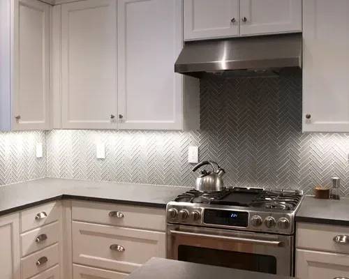 Sbg kitchen photo white cabinets herringbone backsplash